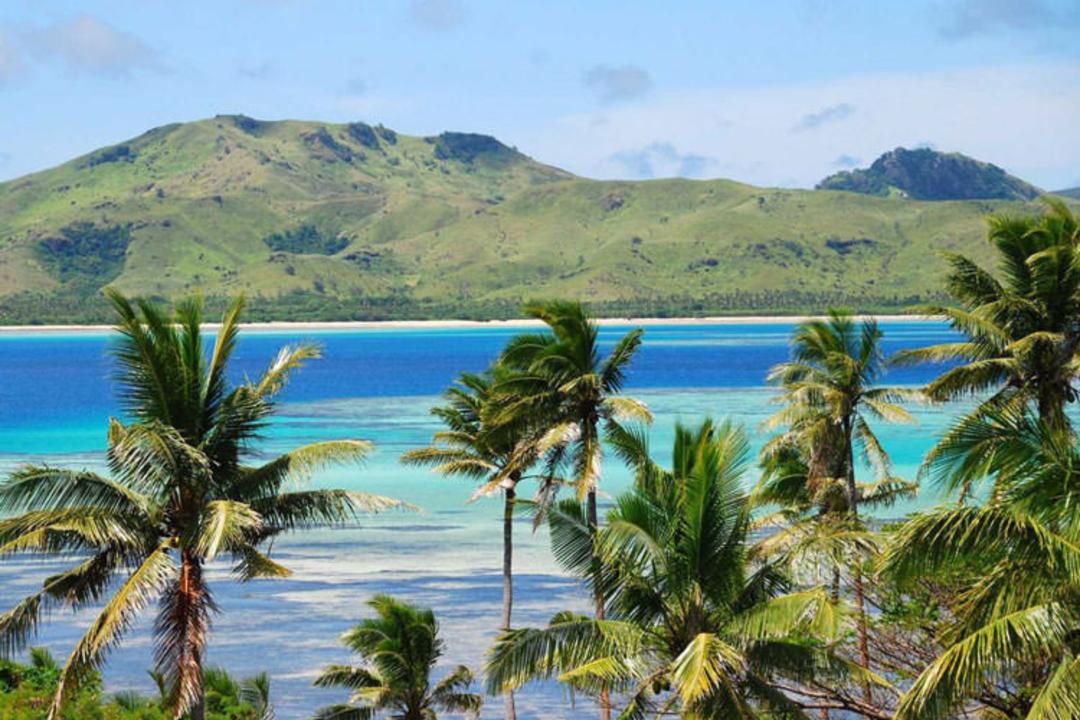 2015-12-blue-lagoons-and-rugged-landscapes-make-fiji-a-honeymoon-spot-suited-for-everything-from-mountain-climbing-to-surfing-to-scuba-diving-to-zip-lining