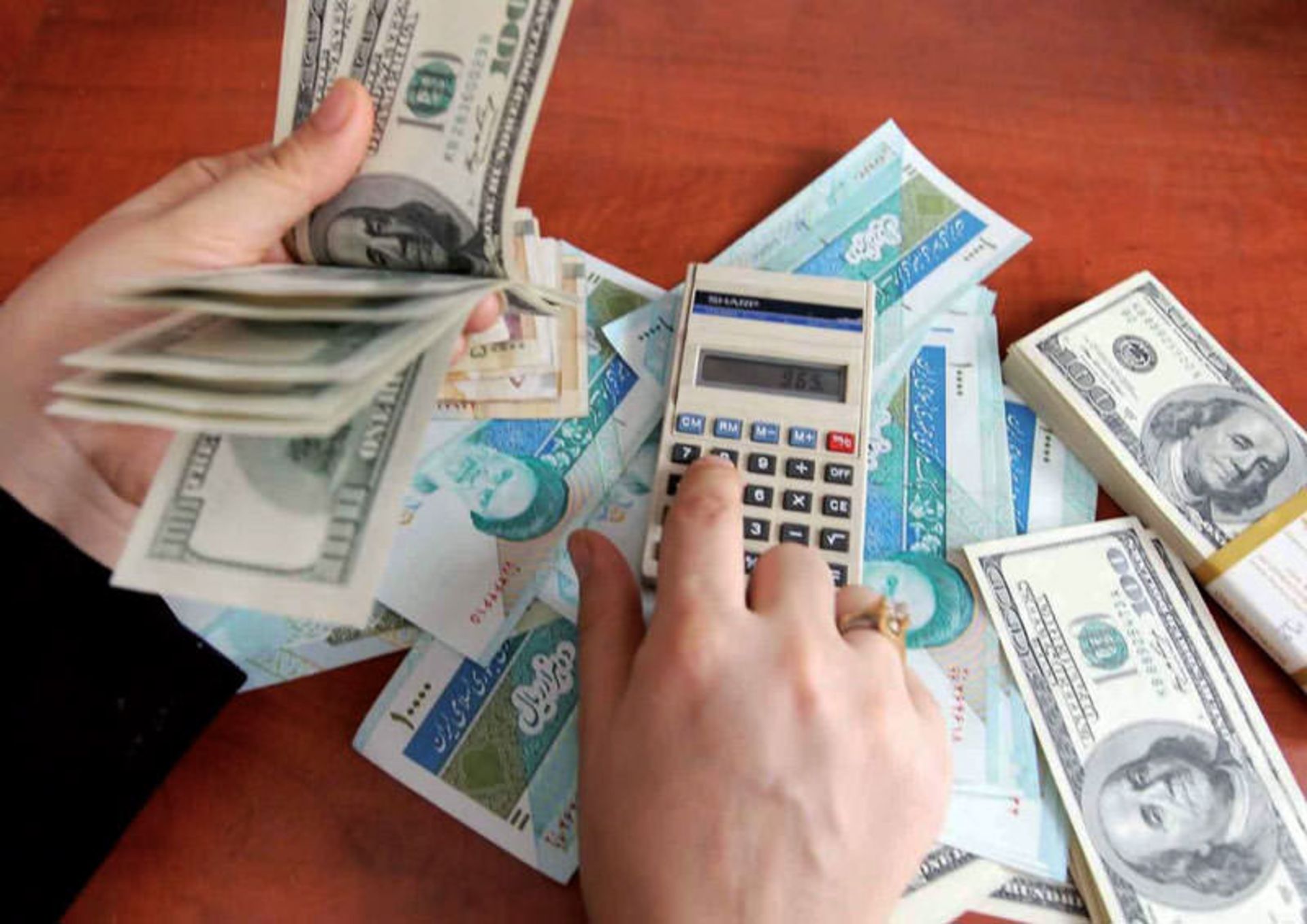 تبدیل ریال به تومان