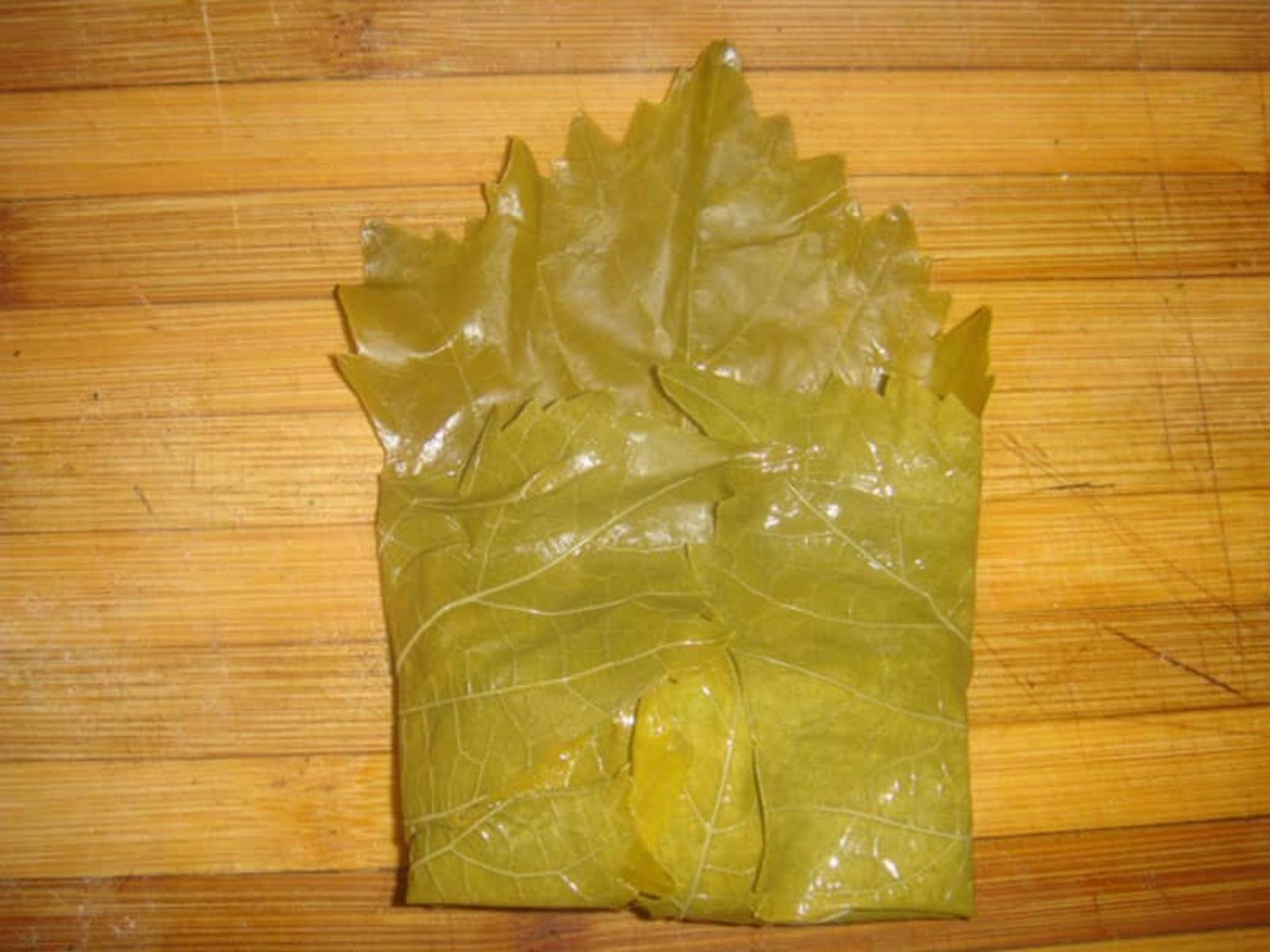 پیچیدن برگ مو