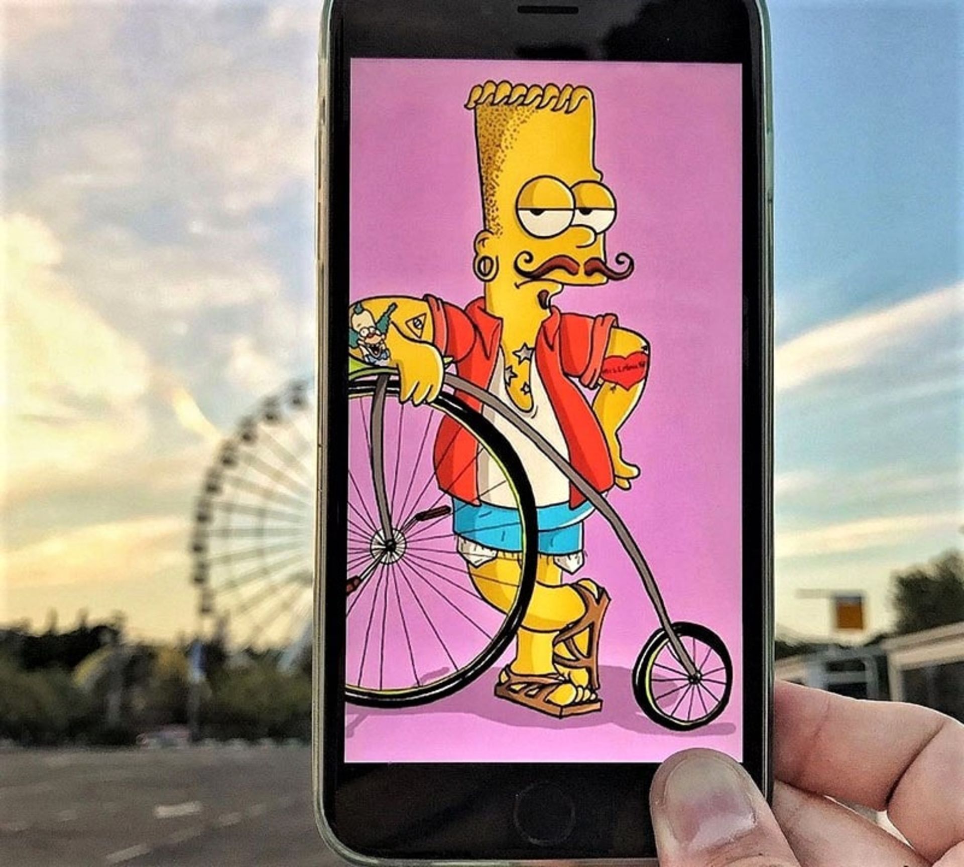 تلفیق عکس سیمپسون‌ با چرخ‌وفلک