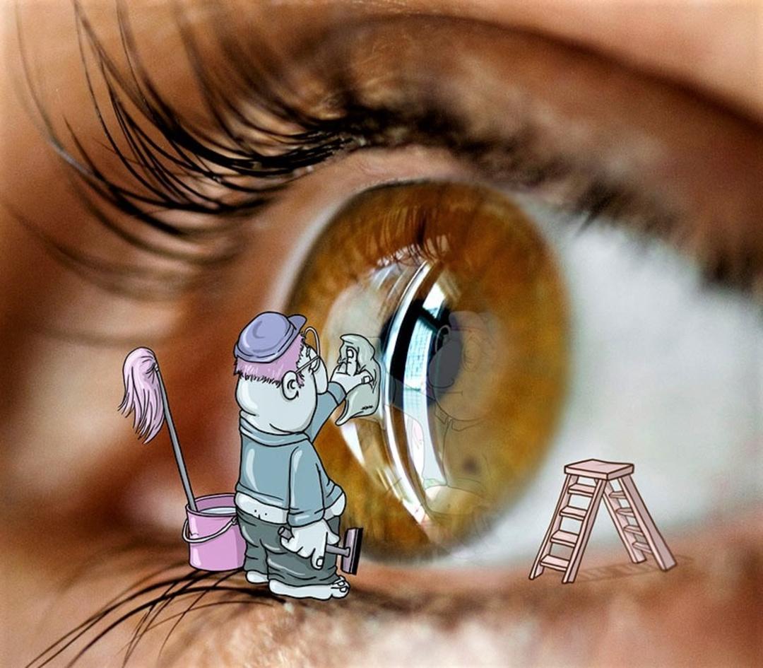 شخصیت کارتونی در حال تمیزکاری مردمک چشم
