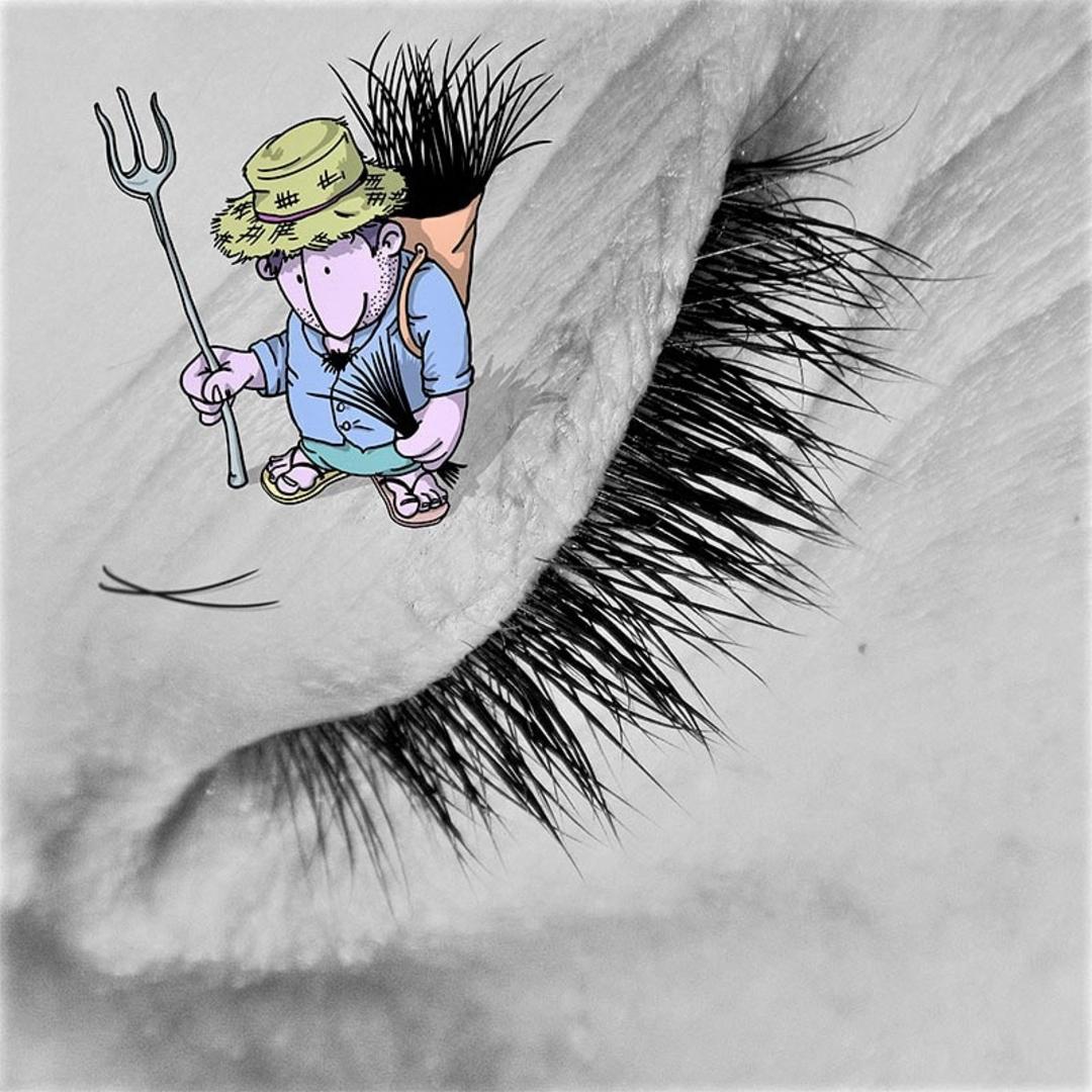 شخصیت کارتونی در حال دروی مژه انسان