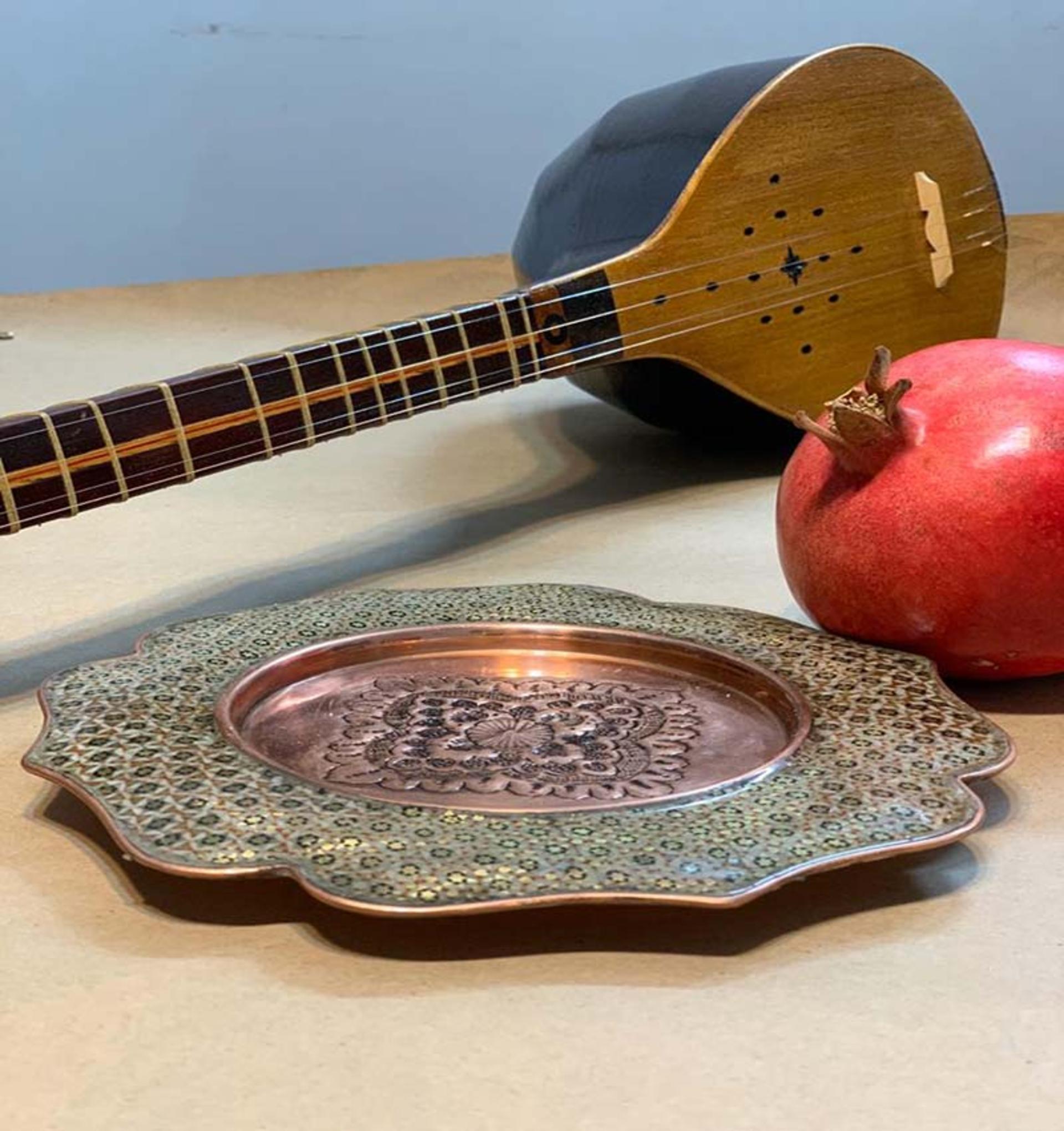 خاتمکاری روی ظرف مسی 