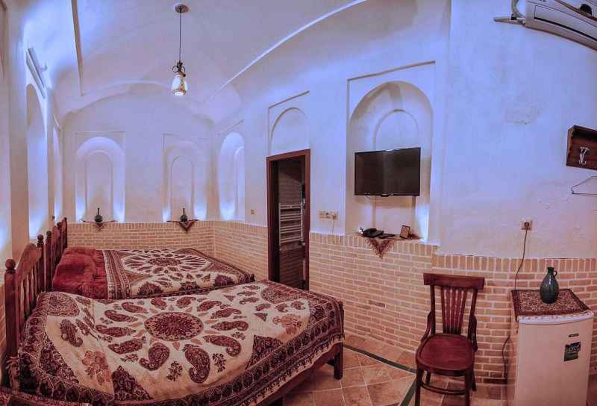 اتاق اقامتگاه سنتی اطلسی