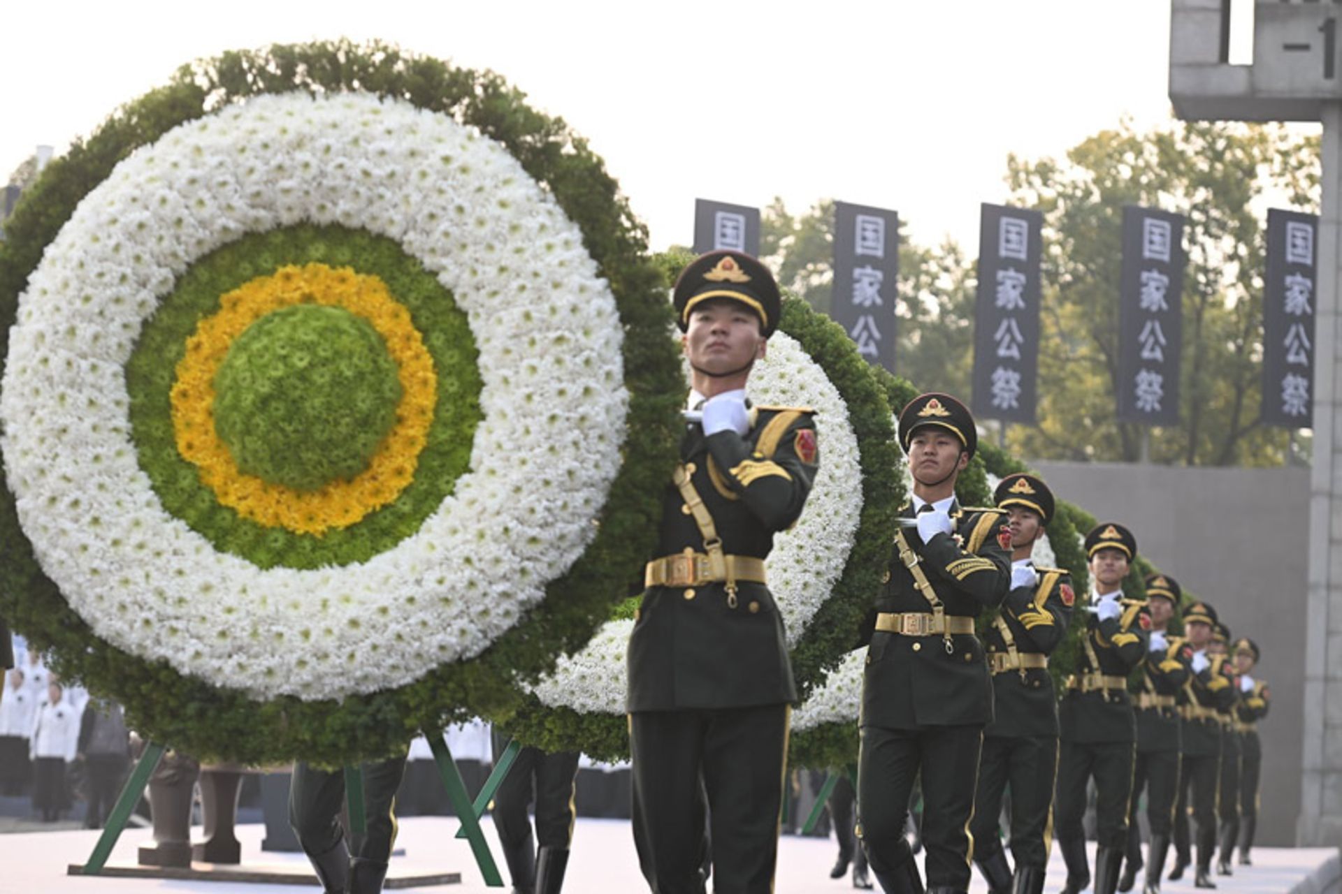 یازدهمین مراسم یادبود ملی قربانیان کشتار نانجینگ (Nanjing) در چین؛ منبع: theguardian؛ عکاس: Ji Chunpeng