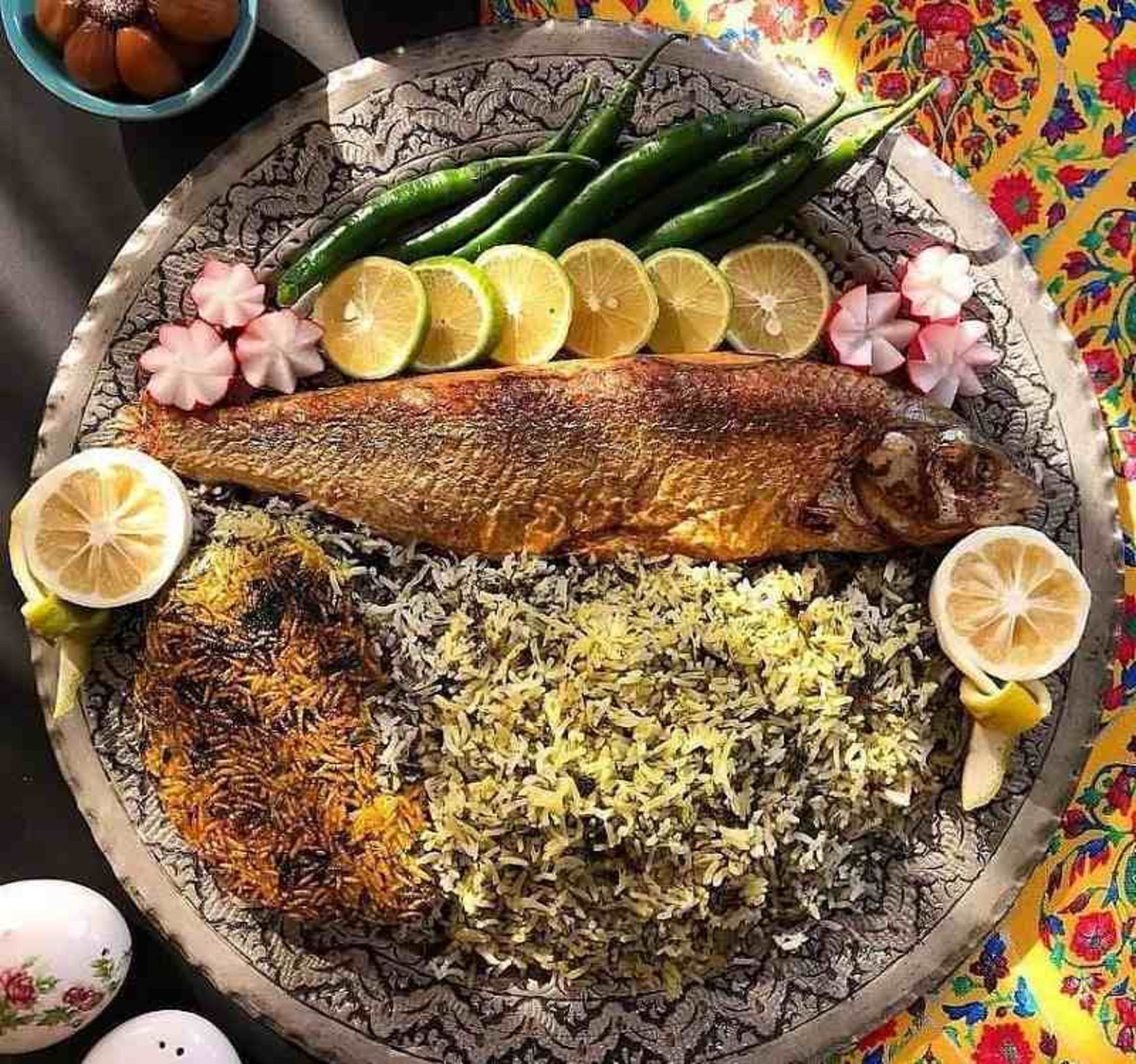 ماهی با دورچین؛ منبع عکس: وب‌سایت ashmazi.com؛ عکاس: نامشخص