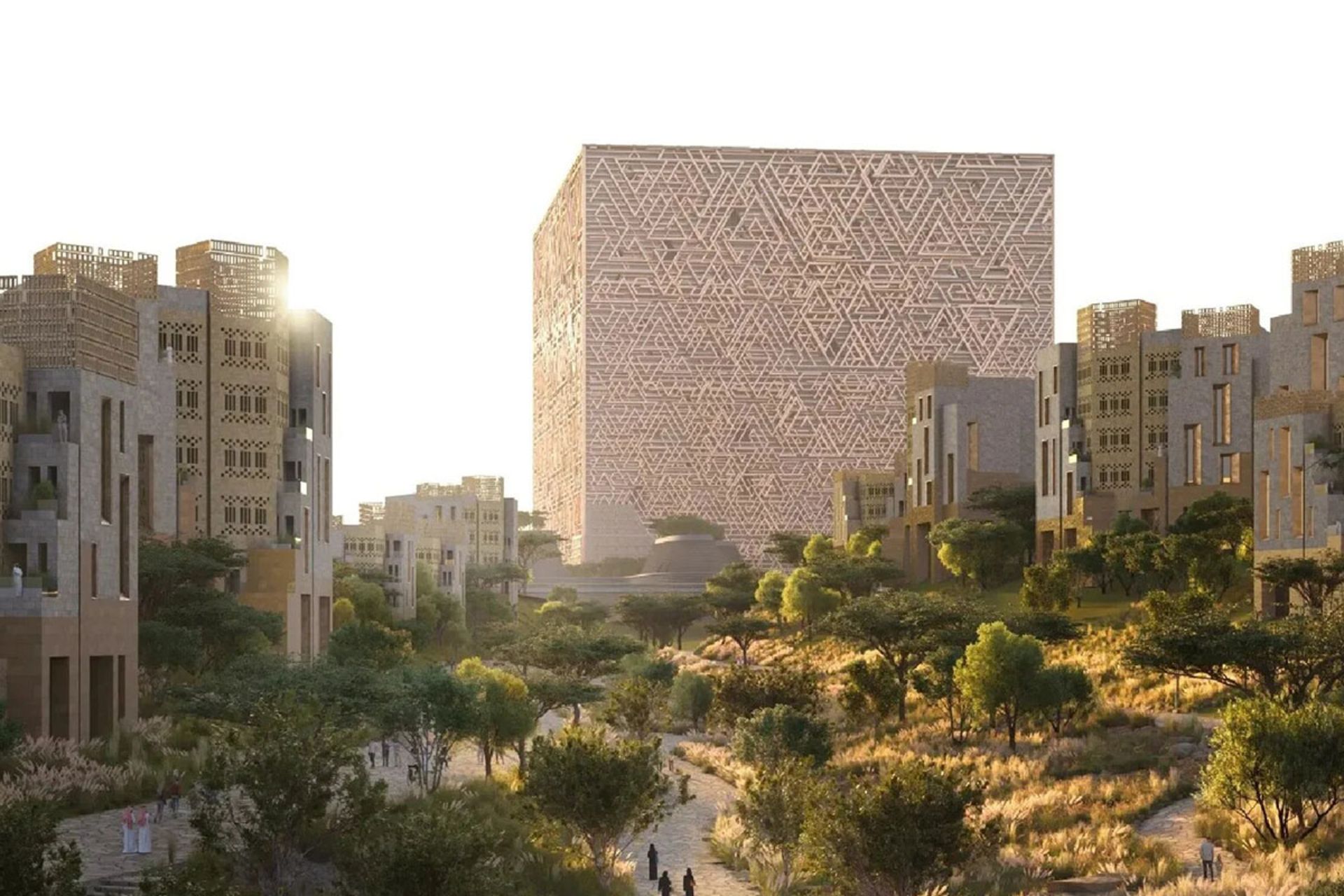 آسمان خراش مکعب در پیش زمینه تصویر که آفتاب از پشت آن می‌تابد