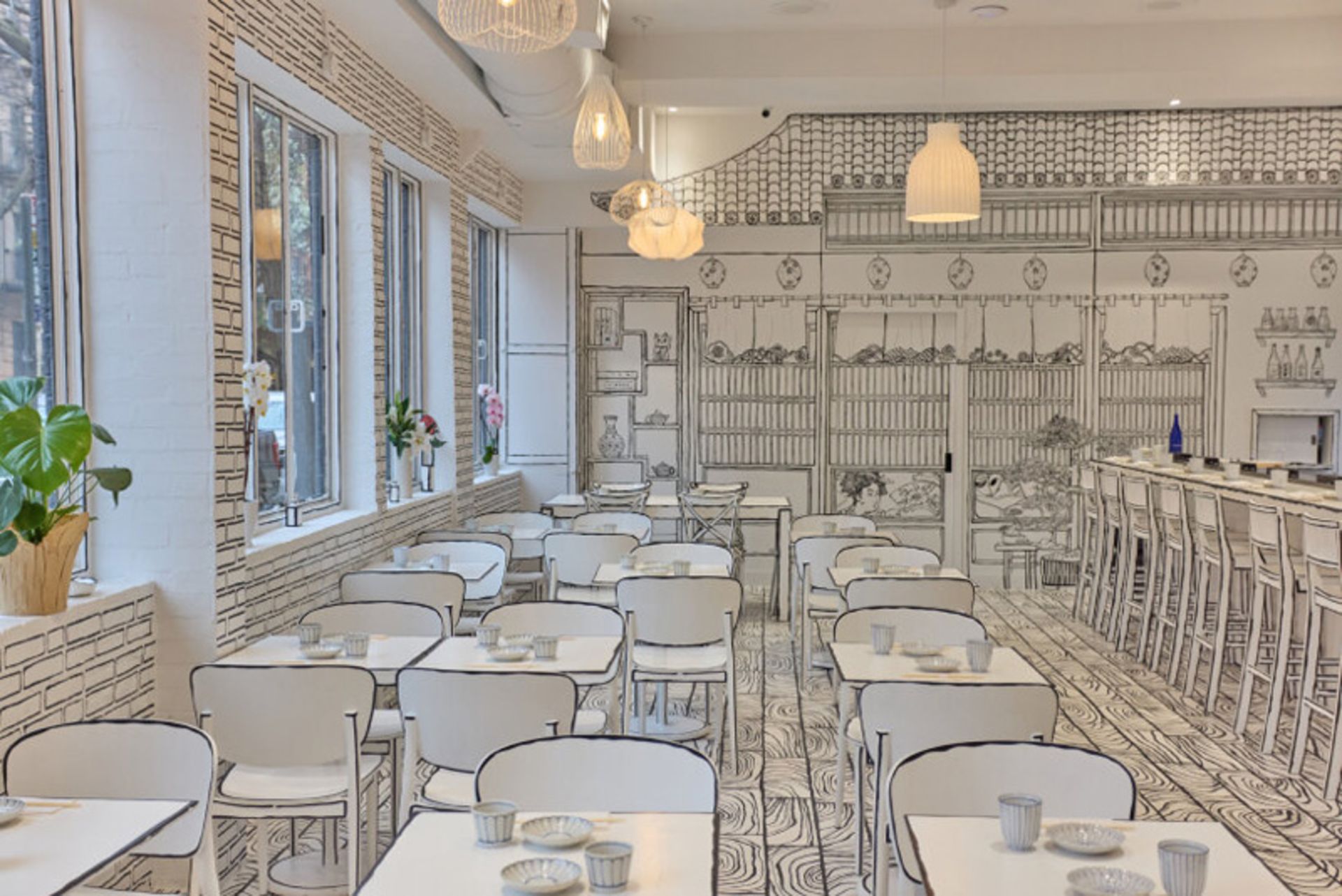 فضای داخلی رستوران با طراحی سیاه‌ و سفید