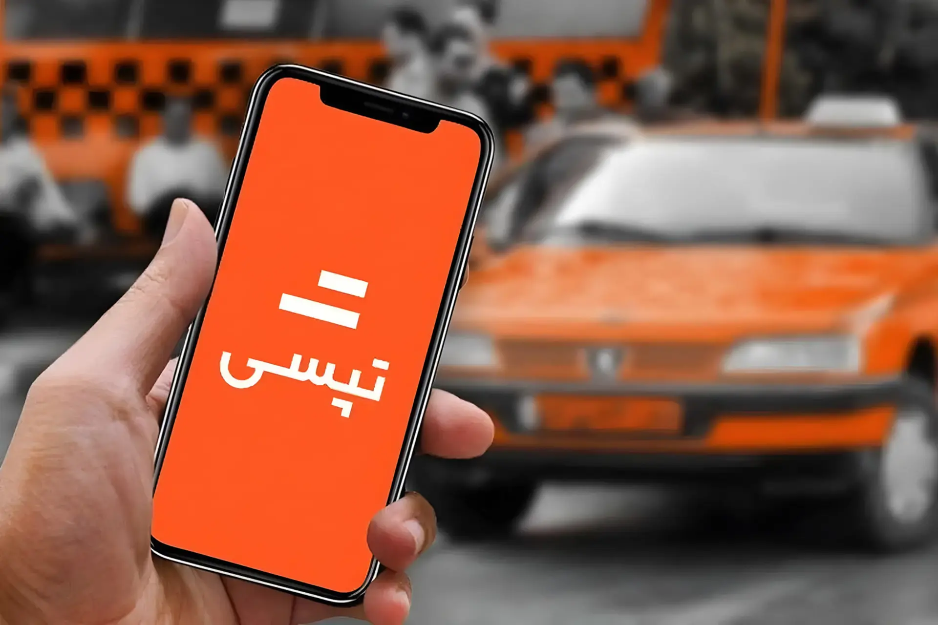 نمای نزدیک از اپلیکیشن تپسی (Tapsi) روی صفحه نمایش گوشی هوشمند